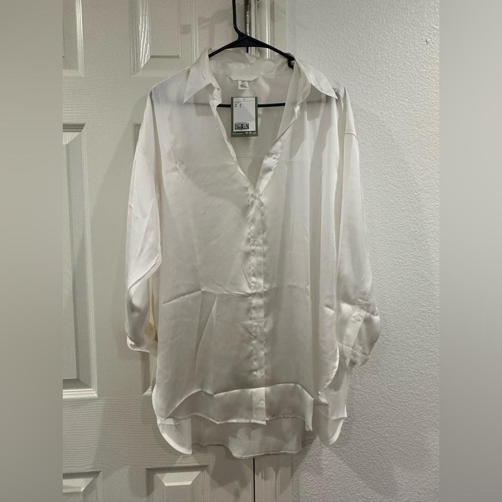 Satiny white long button up shirt